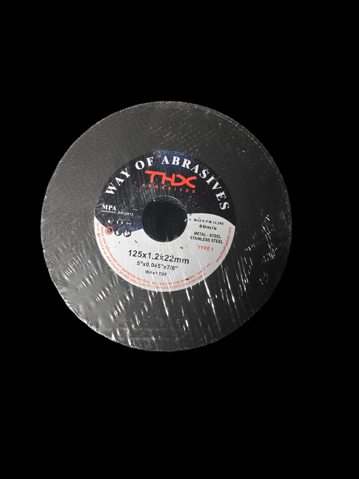 Disc of abrasives with a visible brand label on a dark background