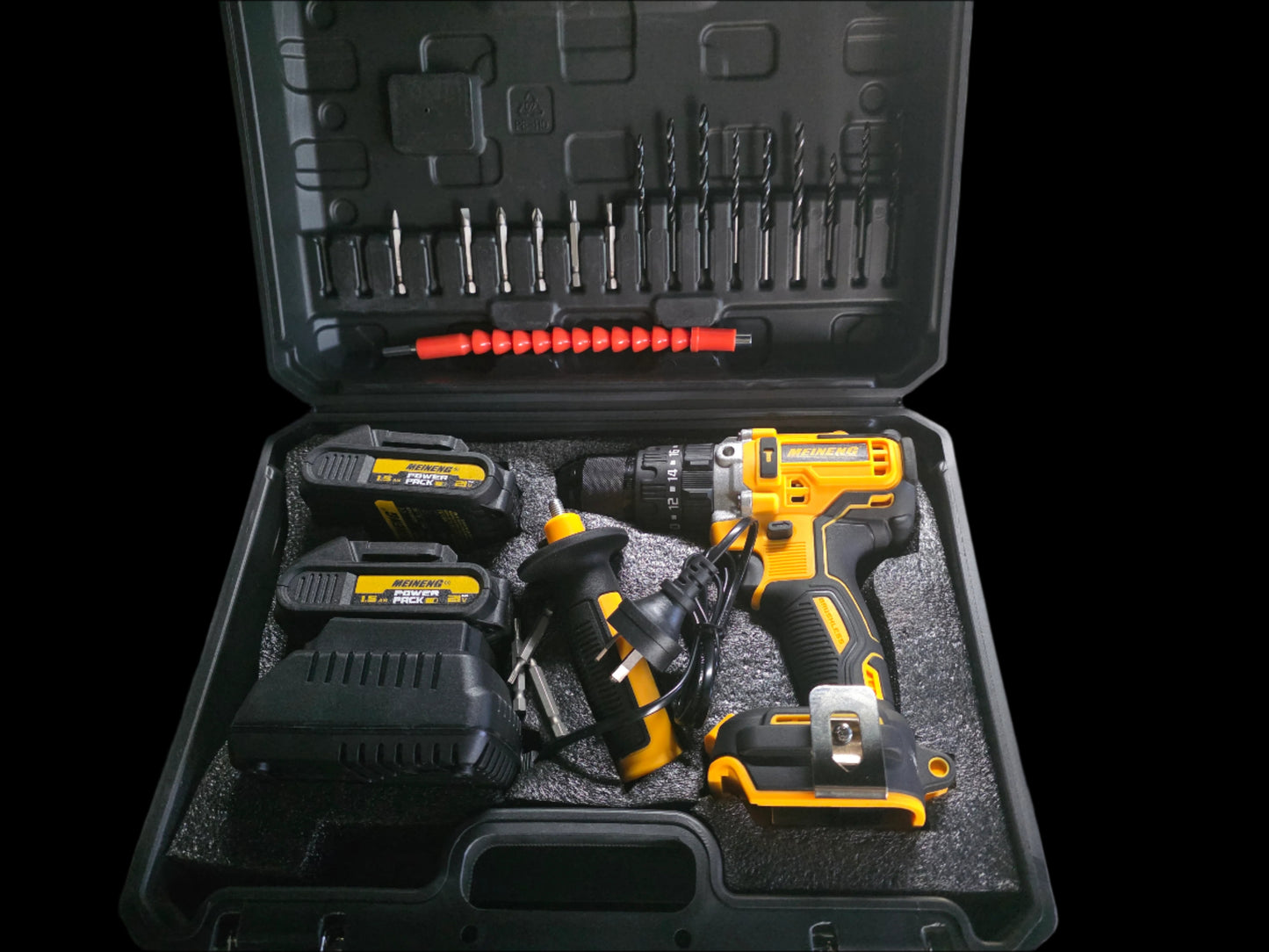 Drill set with drill, battery, and accessories in a carrying case on a gray surface.